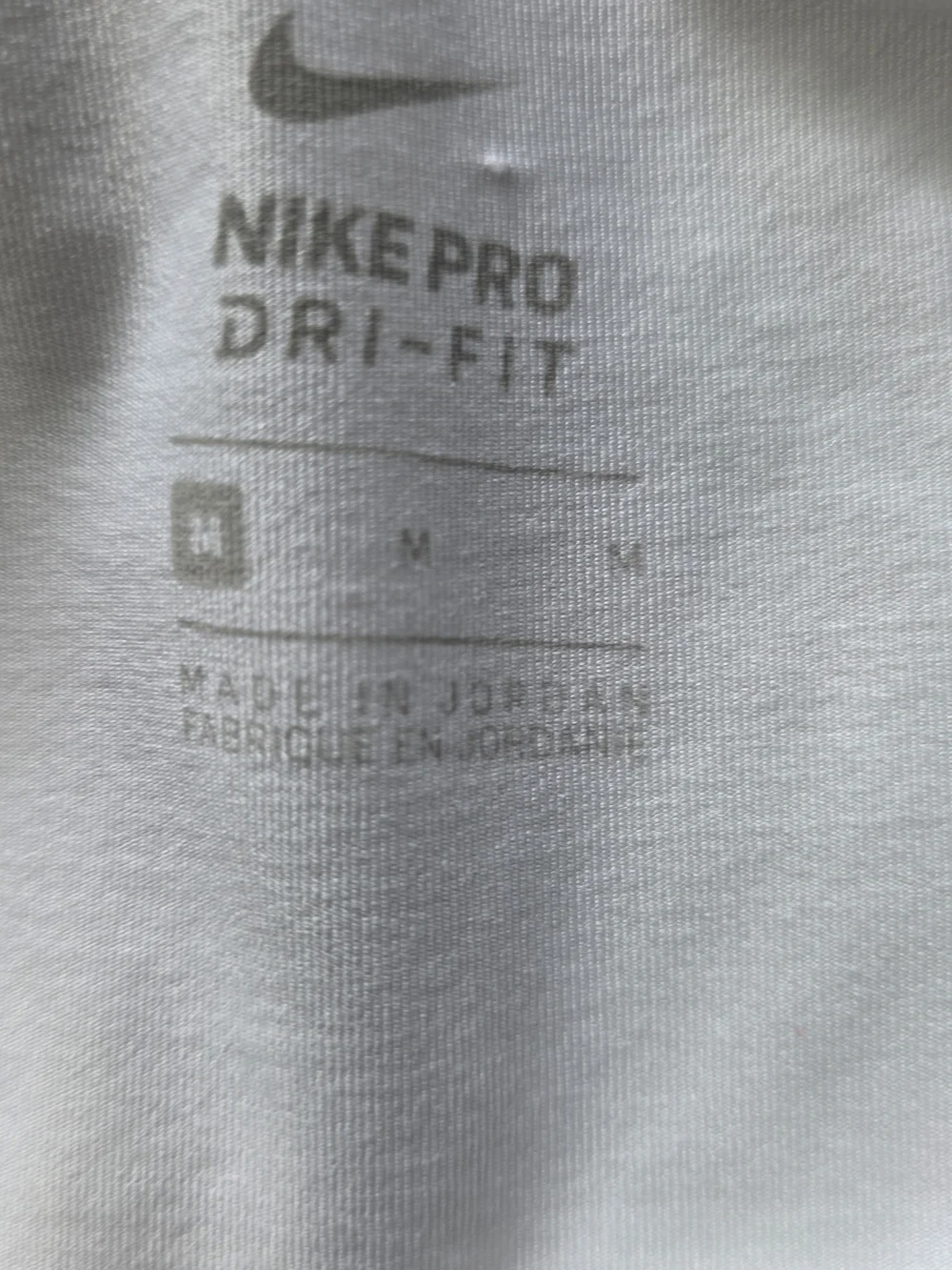 Nike White Tank Top with Black Swoosh